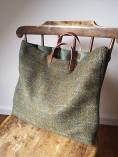 Beautifully handcrafted Harris Tweed bag with real leather handles secured with brass rivets. Green Harris Tweed on both sides.  Fully lined with thick dark green velvet.  Measures approximately 17 by 14 inches.  Harris Tweed Orb label has been sewn on the back of the bag. Classic Luxury Tweed Bag, Luxury Chic Tweed Bags, Elegant Luxury Tweed Bags, Tweed Bags To Sew, Tweed Purse, Tweed Bag, Handcrafted Bags, Small Tote, Harris Tweed