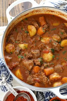 beef stew with potatoes and carrots in a pot