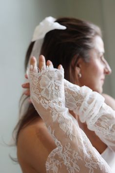 Enhance your wedding ensemble with our luxurious 25-inch bridal sleeves featuring intricate French lace and delicate rose designs. Elevate your look with these 2025 trendsetting statement pieces that exude sophistication and romance. Perfect for any wedding dress, these sleeves will make you stand out on your big day. The timeless beauty of French lace combined with the intricate rose embellishments creates a truly captivating aesthetic that is both feminine and chic. Each sleeve is meticulously Rose Embellishments, Wedding Sleeves, Bridal Sleeves, Captivating Aesthetic, Formal Gloves, Wedding Gloves, Bridal Gloves, Lace Gloves, Lace Bridal