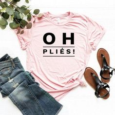 This super cute Oh Pliés Shirt will be sure to turn heads! Makes a perfect gift for someone special that you know or for everyday wear. Grab yours today. This unisex essential fits like a well-loved favorite. Super soft cotton and excellent quality print makes one to fall in love with it over and Ballet Shirts, Ballerina Gift, Calendar Notebook, Ballet Gift, Adhesive Paper, Solid Color Shirt, Custom Shirt, Cute Shirts