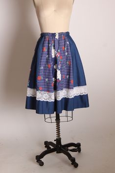 "1970's Red, White and Blue Lace Patchwork Ruffle Lace Square Dance Style Skirt by Carefree Fashions This skirt features: *Blue base color *White and red colors *Patchwork style pattern *Lace Ruffle trim *Square dance style skirt *Elastic waist Label: Carefree Fashions Size: Up to 2X-Large Measurements: Waist: 36\"-42\" Hip: Open Length: 24\" Condition: Excellent If you have any questions, please ask! Find even more Vintage X Large-XX Large at: https://www.etsy.com/shop/NaughtyKittyVintage?secti Retro Patchwork Skirt For Spring, Retro Patchwork Skirt For Summer, Fitted Vintage Skirt With Lace Patchwork, Vintage Blue Flared Skirt, Vintage Tiered Skirt With Patchwork, Vintage Tiered Patchwork Skirt, Vintage Patchwork Tiered Skirt, Retro Fitted Patchwork Skirt, Vintage Blue Skirt With Ruffles