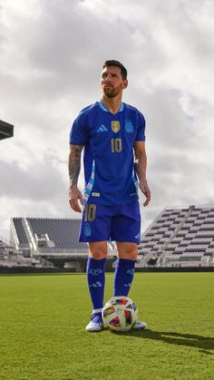 a man standing on top of a soccer field