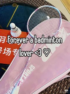 a badminton racket sitting on top of a table