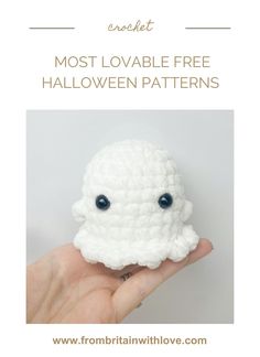 a hand holding a small white crocheted object with the words most lovable free halloween patterns