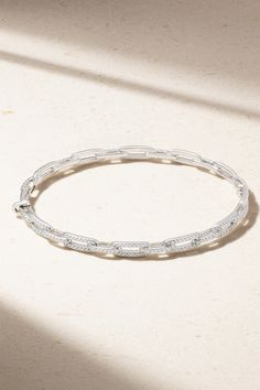 David Yurman's 'Stax' bracelet is timeless and understated, making it perfect for both everyday wear and passing down as an heirloom. Cast from 18-karat white gold, it has a linked silhouette featuring the brand's signature 'Cable' finish and 0.42-carats of shimmering pavé diamonds. Platinum Bangle Bracelets With Single Cut Diamonds, Platinum Bangle Bracelet With Single Cut Diamonds, Timeless Platinum Bangle Diamond Bracelet, Timeless Sterling Silver Bracelet With Solid Link, Elegant Silver Tennis Bracelet With Rectangular Links, Elegant Sterling Silver Bracelet With Rectangular Links, Timeless White Gold Bangle Jewelry, Everyday Luxury Bangle With Solid Link Construction, Elegant Platinum Bangle With Single Cut Diamonds