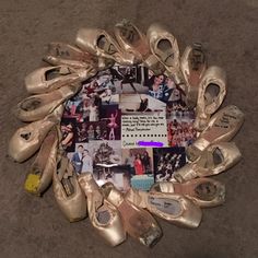 there are many pairs of ballet shoes on the floor with pictures and words all over them