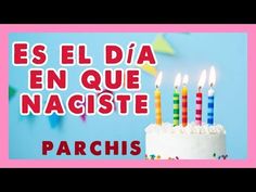 a birthday cake with candles on it and the words, es el dia en que naciste