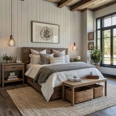 a large bed sitting in a bedroom on top of a wooden floor next to a window