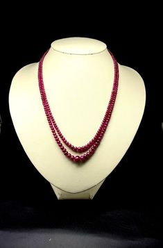 100 % Natural Ruby smooth rondelle shape beaded necklace with adjustable silk cord closure. Details: - Gemstone: Natural Ruby Calibration of beads: From 3.00 millimeters To 6.50 millimeters approx Strand: 2 Gross weight: 212.00 carats Net weight: 185.00 carats Length Of Necklace: Inner 16.00 Inches till Outer 17.00 Inches approx SKU: RUBYBDS0031 100% NATURAL RUBY RONDELLE BEADS 100% GUARANTEED NATURAL RUBY NOT HEATED NOT TREATED NOT DYED PERFECT POLISHED BEADS NECKLACE FOR WOMEN WEAR Thank you f Elegant Single Strand Round Beads, Red Briolette Gemstone Beads Necklace, Red Briolette Gemstone Beads Jewelry, Elegant Ruby Round Beads Jewelry, Single Strand Ruby Bead Necklace, Elegant Rondelle Pearl Necklace With Faceted Beads, Elegant Faceted Rondelle Pearl Necklace, Elegant Pearl Necklace With Faceted Rondelle Beads, Red Briolette Necklace With Faceted Beads