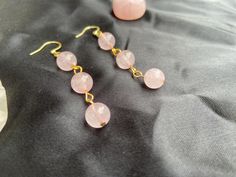 8mm rose quartz beads on hypoallergenic gold hooks Spiritual Gemstone Bead Drop Earrings, Adjustable Gemstone Bead Drop Earrings, Gemstone Bead Drop Earrings For Gifts, Gemstone Round Beads Jewelry Gift For Her, Gemstone Beads Dangle Jewelry Gift, Beaded Round Beads Jewelry Gift For Her, Dainty Pink Jewelry For Healing, Adjustable Drop Earrings As Gift For Her, Beaded Jewelry Gift For Her