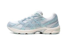 The ASICS Gel-1130 “Birch Blue” is a colorway of the retro shoe with eye-pleasing light blue accenting.  A spring and summer-inspired design, the “Birch Blue” features a white open-mesh construction with Birch Blue synthetic leather overlays.  A “Gel-1130” logo appears on the tongue and “Gel” is spelled out on the inserts on the collar overlay.  Underfoot, a techy-looking midsole with ASICS’s Gel cushioning technology completes the look of the popular sneaker. Jordan Golf, Best White Sneakers, Jordan 4 Bred, Nike X Travis Scott, Popular Sneakers, Gel Lyte, Jordans Women, Womens Jordans, Asics Shoes