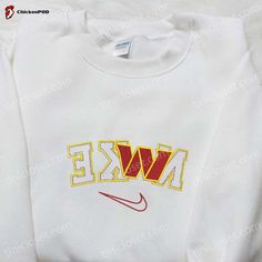 The Washington Commanders x Nike Reverse Embroidered Shirt is the ultimate fan gear for NFL enthusiasts. Made with high-quality materials, this shirt showcases the team’s iconic logo in a unique reverse embroidery design. Its comfortable fit and breathable fabric ensure all-day comfort. Show your team pride with this stylish shirt and stand out from the crowd. Perfect for game days or casual wear, this shirt is a must-have for any true fan. The NFL Sports Embroidered Hoodie is the perfect Candy Cane Nike Sweatshirt, Nike Iron On Grinch Sweatshirts, Christmas Crewneck Sweatshirt Nike, Christmas Hoodie Nike, Nike Embroidery Christmas Sweatshirt, Nike Christmas Sweatshirts, Grinch Nike Embroidery, Christmas Embroidery Sweatshirts Nike, Embroidery Hoodie Nike