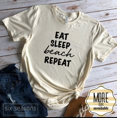 Eat Sleep Beach Repeat If you are looking for a super cute and funny beach shirt for your next vacay, this is a must have Take me to the beach! You will fall in love with how soft our t-shirts are. Our Unisex shirts are a little longer in length so you can throw it on over a pair of your favorite leggings and you're ready to go! They also make for great layering shirts. Our shirts are professionally made by our little family right here in the USA! Sizing: (This shirt has a unisex fit. We recomme Funny Womens Shirt, Vacation Shirts Beach, Womens Graphic Tee, Pizza Shirt, Heat Press Designs, T Shirt Womens, Womens Tshirt, Funny Shirts Women, Layered Shirts