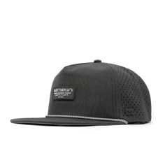 the emmeur hat is black and has a white patch on the front of it