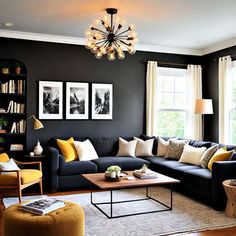 a living room with black walls and yellow accents