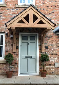 the front door to a house with potted plants on either side and text overlay that says case study