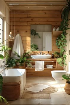 a bathroom with wooden walls and plants in the bathtub, along with two toilets