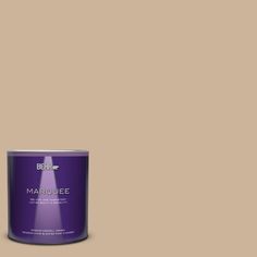 a can of marquee paint on a brown background