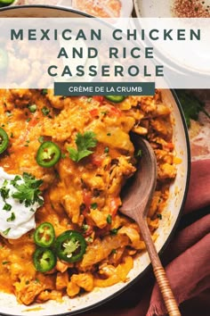 mexican chicken and rice casserole in a skillet with sour cream on top