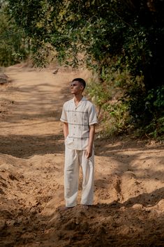 a man in a big chequered white organic cotton shirt standing in a middle of a village road. Half sleeve shirt, kala cotton fabric, suf embroidery White Summer Shirt With Chikankari Embroidery, White Cotton Shirt With Chikankari Embroidery, White Cotton Chikankari Embroidered Shirt, Traditional White Linen Shirt, Suf Embroidery, Afternoon Sun, Shirt Detail, Steam Iron, Drip Dry