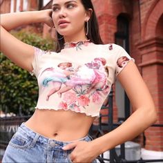 Brand New Without Tags. Cute Sheer Top With Baby Angels And Pink Flowers. Cute White Fitted Crop Top, Cute Fitted White Crop Top, White Fitted Cute Crop Top, Cute Fitted Crop Top For Spring, Denim Halter Top, Red Tube Top, Basic Crop Top, Brown Crop Top, Satin Crop Top