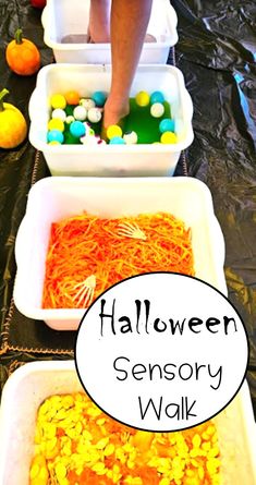 three white bowls filled with halloween candy and sprinkles on top of a table