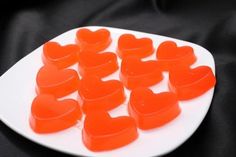 heart shaped candies on a white plate