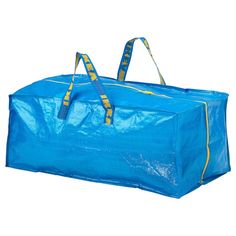 a large blue bag with yellow handles