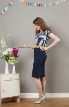 Wonderfully cozy dress in fine viskose jersey with short puffed sleeves and in three different colors. The beautiful fabric is striped and navy blue. Nele has a simple shell which is slightly gathered at the neckline. The curved waistband is made of Romanitjersey in yellow and creates a great silhouette. The skirt is slightly gathered at the cuffs, which makes for a comfortable length. He has a straight cut and makes his two pockets for a casual feel. Nele is available in german sizes 36-42. Or Older Women Dresses, Style Bleu, Summer Dress Patterns, Cozy Dress, Feminine Outfit, Buy Dress, Blue Fashion, Beautiful Fabric, Classy Outfits