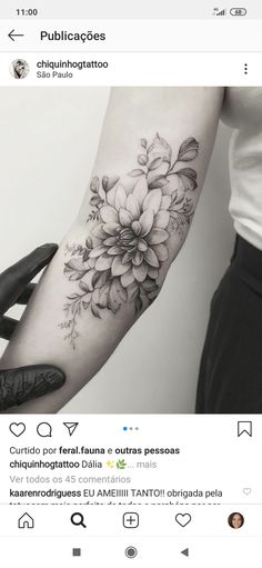 a person with a flower tattoo on their arm