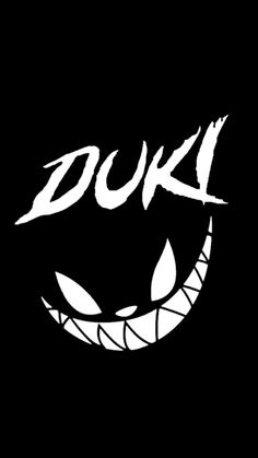 a black and white photo with the word'duki'printed on it, in front of a dark background