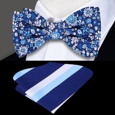 Blooms of Elegance: The Shades of Blue and White Floral Silk Bow Tie A Garden of Style Blooms in Every Knot In the world of men's fashion, a bow tie is not just an accessory; it's an emblem of style and individuality. Our Shades of Blue and White Floral Silk Bow Tie transcends traditional boundaries, offering a garden of intricate flowers that tell a story of elegance and sophistication. In this blog post, we immerse ourselves in the details of this silk masterpiece, exploring styling options, p Classic Blue Tie With Butterfly Knot, Classic Blue Bow Tie With Butterfly Knot, Classic Blue Bow With Butterfly Knot, Blue Wedding Ties With Decorative Bow, Classic Blue Bow Tie For Summer, Summer Blue Bow Tie And Accessories, Blue Summer Bow Tie For Business, Summer Blue Bow Tie And Suit Accessories, Blue Bow Tie For Summer Business Events