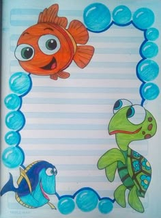 a drawing of two fish and a turtle on a sheet of paper with blue bubbles