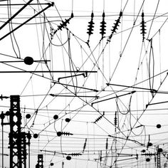 black and white photograph of many electrical wires