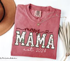 Are you looking for Merry Mama Est 2024 Shirt? We got you! ✅ ABOUT OUR New Mom Christmas Comfort Color T-shirt  ▸ 100% ring-spun US cotton for long-lasting comfort.  ▸  The garment is sewn around the finished edges with double stitching, making it long-lasting ▸  The garment is dyed after it's been constructed, giving it a soft color and texture ▸ Printed and shipped from the USA ✅ HOW TO ORDER your Xmas Pregnancy Announcement Shirt  1. Check our photos for sizing and color options. 📏 2. Choose Mom Christmas Shirt, Photo Care, Pregnancy Announcement Shirt, Mom Christmas, Holiday Shirt, Christmas Mom, Comfort Color, Christmas Gifts For Mom, Holiday Shirts