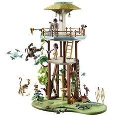 a tall tower with people and animals on it's sides, surrounded by other figurines