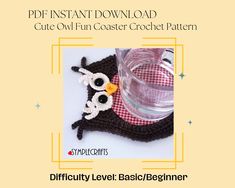 a crocheted owl hat with an empty cup on the side and text that says instant