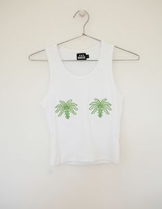 Ribbed white tank top with embroidered Rue Dix Palm Trees and rhinestone detail Cotton blend Machine wash cold, tumble dry lowFor maximum wear, hand wash and line dry White Embroidered Cotton Tank Top, White Embroidered Tank Top, Embroidered Tank Top, Embroidered Tank, White Tank Top, White Tank, Palm Tree, Palm Trees, New Era