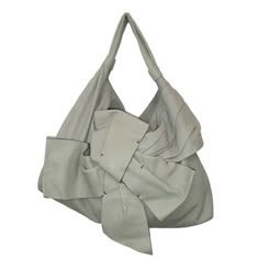 Valentino Grey Nappa Leather Bow Hobo Style Tote W/ Black Top Stitching. This Unstructured Bag Has 2 Soft Handles, Magnetic Snap Closure, Black Satin Lining, 1 Zipper Pocket And 2 Patch Pockets Inside. No Tears Or Damages, Very Light Grey That My Camera Cannot Seem To Capture. In The Colour Of The Leather , I Cannot Describe How Soft The Leather .Undetectable Whilst Wearing. "Distressed" Look. Had A A Black Enamel Painted Metal Logo Plate On The Side. In Overall Like New ,It Comes With A Bust Ba Designer Gray Leather Shoulder Bag, Gray Leather Evening Shoulder Bag, Evening Gray Leather Shoulder Bag, Chic Gray Soft Leather Shoulder Bag, Fashion Moodboard, Hobo Style, Leather Bow, Duffel Bags, Painted Metal