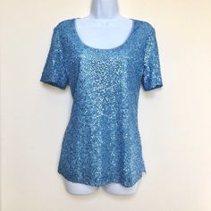 Simple Yet Classy! You Can't Go Wrong W/ This Gorgeous Sequin Blouse From St.John Brand. Classic Design W/ Right Length & 2 Layers On The Front. Excellent Quality, Great Form & Flattering! So Classy! Nwot. Excellent Condition Except For 2 Small Lighter Spots On The Back (Pic 6) Due To Storage, But Almost Unrecognizable When Worn. Nvr Been Used! My Sister Bought $595 Plus Tax At Neiman Marcus. Details: - Approx. Laying Flat: Length 25.5”, Shoulder 16”, Bust 17.5", Waist 16”, Hip 19.5". Womens Silk Shirts, Back Pic, Sequin Blouse, Mock Neck Blouse, Black Drapes, Blue Floral Blouse, Blouse Tank Top, White Tunic, Cap Sleeve Top