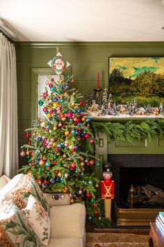 a decorated christmas tree in the corner of a living room