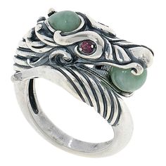 Jade of Yesteryear Green Jade and Pink Tourmaline Dragon Ring Wrapping around your finger, this mythical sterling silver dragon ring captivates with its piercing pink tourmaline eyes and natural green jade details, including a bead clutched in its mouth.       Approx. 7/16"L x 1-1/16"W x 1/2"H; shank 1/8"W     Stamped .925 sterling silver; rhodium plating   Stone Information       All sizes and weights approximate     Green Jade - Pear (6x4mm), smooth bead (5.5mm to 6mm)     Pink Tourmaline - Ro Dragon Ring, Silver Dragon, Color Bands, Beaded Clutch, Funky Jewelry, Jade Jewelry, Bang Bang, Green Jade, Wrap Rings