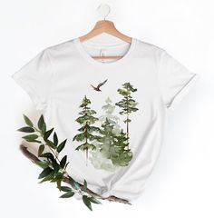 Watercolor Trees Shirt Forest Graphic Tee Nature Tshirt - Etsy White Watercolor Print Short Sleeve T-shirt, White Relaxed Fit T-shirt With Watercolor Print, Crew Neck T-shirt With Watercolor Print, Crew Neck Cotton T-shirt With Watercolor Print, Pine Tree Landscape, Forest Graphic, Camping Tee, Tree Landscape, Nature Shirts