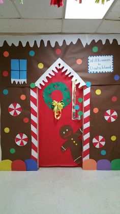 a gingerbread house door decorated for christmas