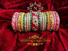 Designer Indian Wedding Multi Color Chura Set. Decorated With Glass Kundan & Stone Work All Over. Beautiful Kundan Floral & Leaf Figure On Center Bangle. Made On Acrylic Base. Make Your Day Most Memorable And Loveable With This Captivating Ensemble. This is a set of 38 Bangles (19 Bangles For Each Hand). Multi Color Wedding, Kundan Stone Work, Wedding Chura, Multicolor Wedding, Punjabi Style, Bridal Chura, Kundan Bangles, Kundan Work, Crystals Beautiful