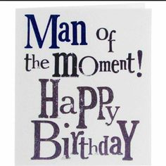 a card with the words man of the moment happy birthday written in black and white