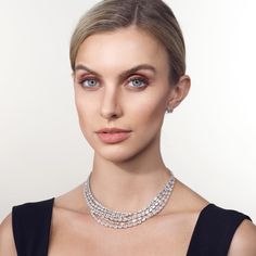 A covetable jewel with a larger than life shine, this multi-layered diamond necklace offers an allure that cascades gracefully across the neckline. Its multiple rows of diamonds in different cuts provide a full-coverage sparkle. Showcasing X carats of diamonds, indulge in a showstopping piece that will enduringly stand out and leave a lasting impression. Dazzling Diamond Necklace With Accents For Evening, Dazzling Diamond White Necklace For Evening, Sparkling Diamond Bridal Necklace For Evening, Evening Diamond Necklace With Single Cut Diamonds, Dazzling Diamond Cut Diamond Necklace For Evening, Evening Brilliant Cut Cubic Zirconia Diamond Necklace, Evening Brilliant Cut Diamond White Diamond Necklace, Evening Crystal Diamond Necklace In Fine Jewelry Style, Fine Jewelry Diamond Necklace With Sparkling Stones For Evening