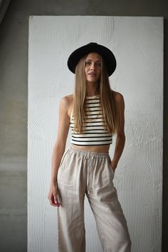 Our Wide Leg Linen Pants are your perfect pick for hot summer days and warm autumn evenings. With an elastic waist and inner pockets, they're designed for YOUR comfort. These super stylish pants effortlessly pair with crop tops, linen shirts, or anything in your wardrobe. Whether you're going for a classic or casual look, they've got you covered!  We offer two fits--regular and tall. If you're searching for the perfect length pants, look no further! Available in a variety of colors and sizes, LI Relaxed Fit Summer Harem Pants, Summer Style Relaxed Fit Harem Trousers, Summer Relaxed Fit Harem Pants, Casual High-waisted Harem Pants For Summer, Casual Summer High-waisted Harem Pants, Loose Fit Summer Harem Trousers, Casual Harem Pants For Summer Day Out, Casual Summer Harem Pants For Day Out, Summer Cotton Harem Pants For Day Out