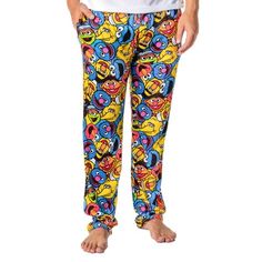 These are OFFICIALLY LICENSED adult Sesame Street pajama pants! Many of us grew up watching this incredible kids' television program and learning from the many fun characters. Each pair of Sesame Street sleep pants features seven fun puppet characters from the show, Elmo, Grover, Cookie Monster, Oscar The Grouch, Big Bird, Bert, and Ernie! These Sesame Street adult lounge pants are extremely high-quality with a new fabric blend style. It is made of an exquisite 92% polyester / 8% spandex fabric Cookie Monster Sleep Pants, Bert Ernie, Mens Pyjama Bottoms, Bert And Ernie, Collage Pattern, Face Collage, Cotton Pajama Shorts, Character Face, Recliner Couch