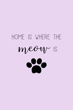 a black and white dog paw print with the words home is where the moon is